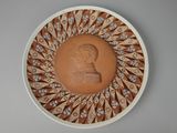 une assiette avec l'image d'un homme dessus