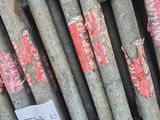 a lot of pipes that are stacked up together