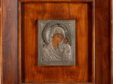 an old wooden frame with a picture of a woman and child