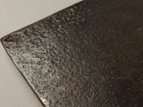 a close up of a knife on a table