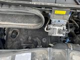 a picture of a car engine with its hood open