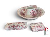 a picture of a set of three pieces of pottery