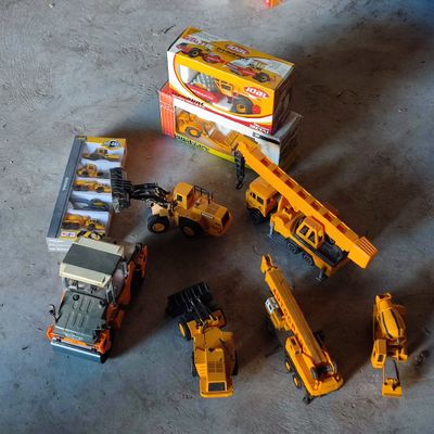 beaucoup de jeux de construction qui traînent par terre
