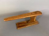 an image of a wooden knife holder on a table