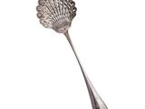 silver plated serving spoon with scallop shaped handle
