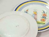 two plates that are sitting on a table