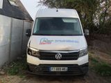 a white van that is parked in front of a house