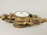 a clock that is sitting on top of a table