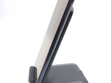 a cell phone that is sitting on top of a stand