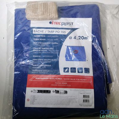 a close up of a bag of blue tarp on a table