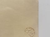 a small piece of paper that has a picture of a monkey on it