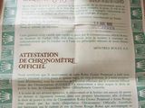 a piece of paper with a red wax stamp on it