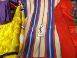 a striped shirt with a blue and red stripe on it