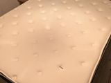 an image of a mattress that is in a room