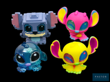 three toy figures of different colors and designs on a black background