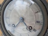 a clock that is on the wall of a building