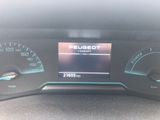 the dashboard of a car with a digital display on it