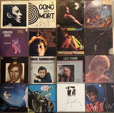 a lot of records on the wall of a room