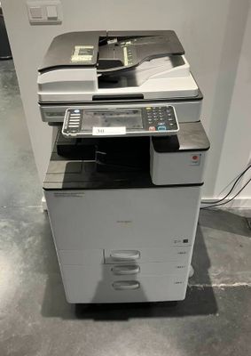 a photo of a multi - function printer in a room