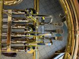 a brass instrument that is sitting on a table