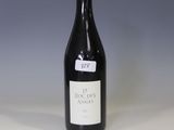 a bottle of wine that is sitting on a table