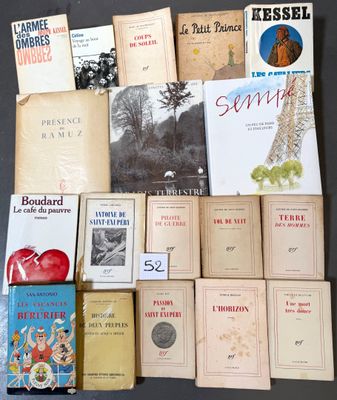 a lot of books that are sitting on a table