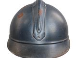 a metal helmet with a metal handle on a white background