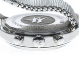 the watch has a chain strap around the face of it