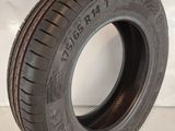 a close up of a tire on a white surface