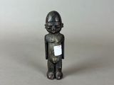 toy soldier figurine with a name tag on it ' s chest