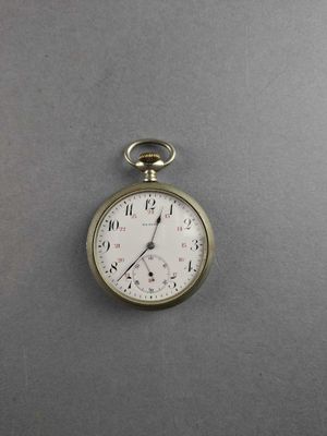 a silver pocket watch with roman numerals on the face