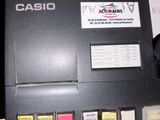 a cash register that is sitting on a counter