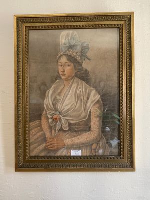 a painting of a woman with a hat on a wall