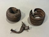 two pieces of metal that have been placed on a table
