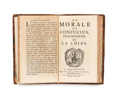 an open book with a picture of a lion on it