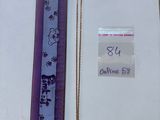 a picture of a pen and a ruler on a table