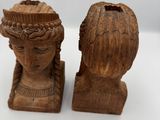 pair of carved wooden busts of a woman and a man