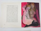 an open book with a picture of a woman in a pink dress