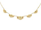 un collier plaqué or orné de cinq feuilles sur une chaîne