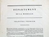 an old book with a black and white image on it