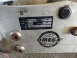 an old machine that is sitting on the ground