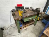 a workbench with tools on it in a garage