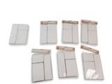 plusieurs feuilles de papier blanc sont empilées les unes sur les autres