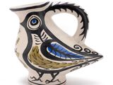 an image of a ceramic vase with a bird on it