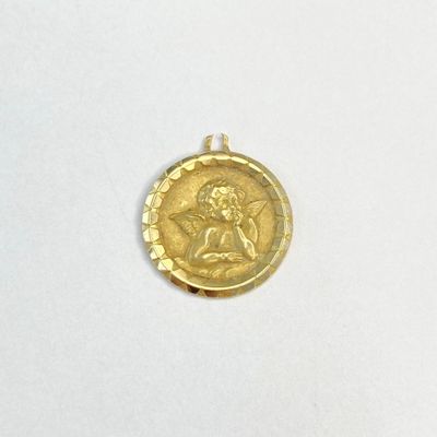 une image représentant une pièce d'or sur laquelle figure le portrait d'une femme
