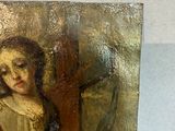 a picture of a painting of a woman holding a cross