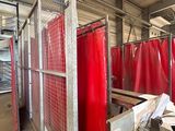 a room with a lot of red curtains in it
