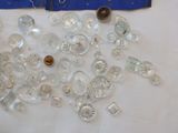 a pile of clear glass pieces on a table