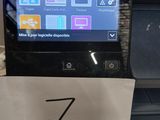 an image of a printer with a paper on it