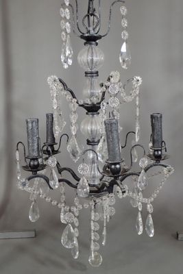 Suspension en métal moucheté noir et pampilles, fût en verre…
